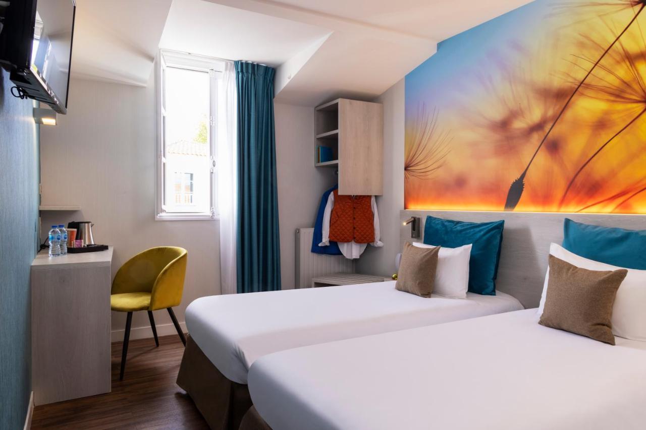 Logis Hotel-Restaurant Le Fontarabie ฟอนทีเนย์-เลอ-คอมต์ ภายนอก รูปภาพ